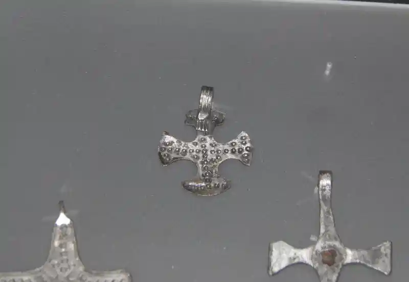 Silver dotted cross pendant
